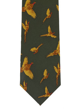 Pheasants golden brown flying on green